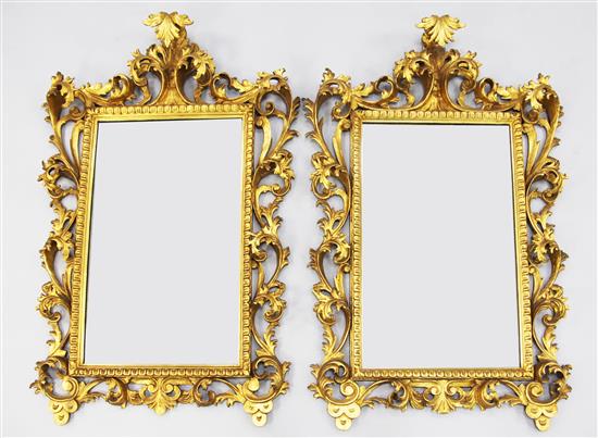 A pair of 19th century Florentine gilt wall mirrors, W.3ft 2.5in. x 2ft 3in.